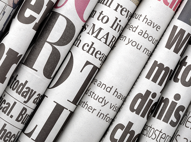 various rolled newspapers